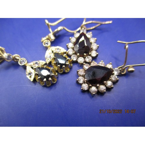 63 - Two pairs of earrings, one marked for gold the other yellow metal, having various types of stone, bo... 