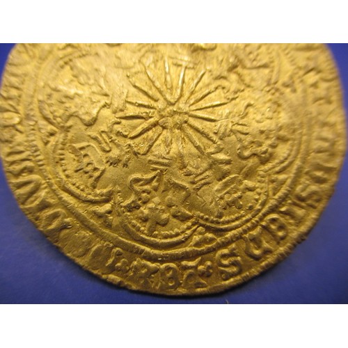 143 - An Edward IV gold rose Noble, London mint, type VII (1466-7) the obverse crowned king in ship with i... 