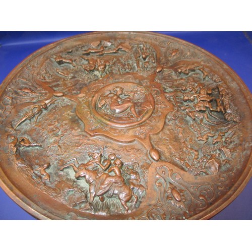 163 - A decorative bronzed metal pedestal Taza, having prolific cast and embossed decoration of royal hunt... 