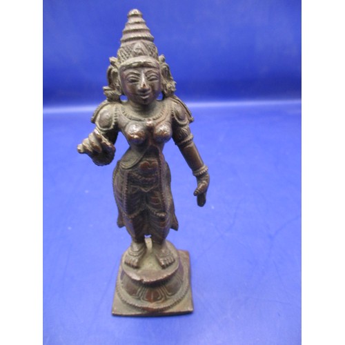 164 - An antique cast bronze Asian deity, approx. height 9cm, in good used condition