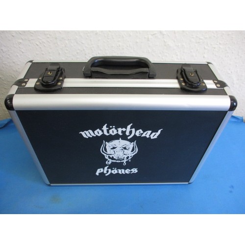 327 - An unused cased set of Motorhead head phones, a limited edition set no 97/100 with certificate and C... 