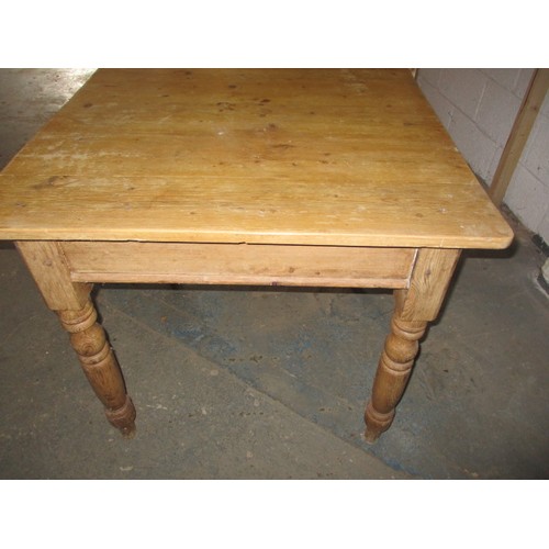 275 - A 19th century square pine kitchen table, with cutlery drawer. Approx. sizes: height 75cm, width 83c... 