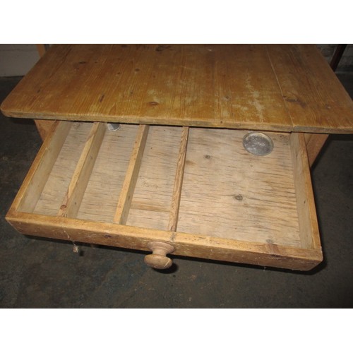 275 - A 19th century square pine kitchen table, with cutlery drawer. Approx. sizes: height 75cm, width 83c... 