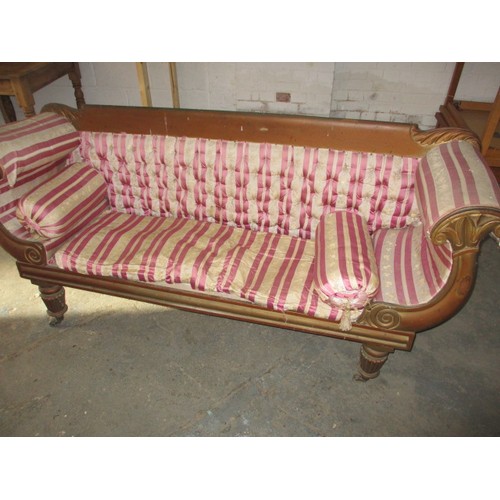 336 - A 19th Century upholstered sofa, with decorative scroll ends and show wood back. Approx. length 184c... 