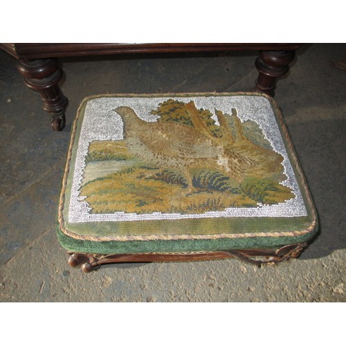 335 - A 19th Century walnut spoonback chair, with floral bead work upholstery and matching foot stool. In ... 