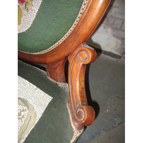 335 - A 19th Century walnut spoonback chair, with floral bead work upholstery and matching foot stool. In ... 