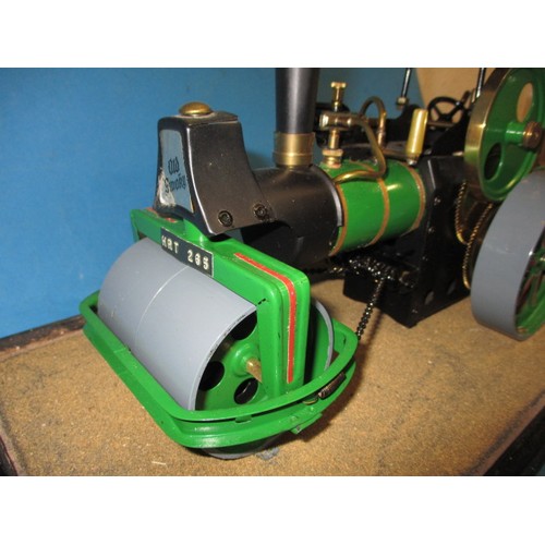 288 - A vintage Wilesco live steam roller, in glazed display case, approx. length of model 32cm in very go... 