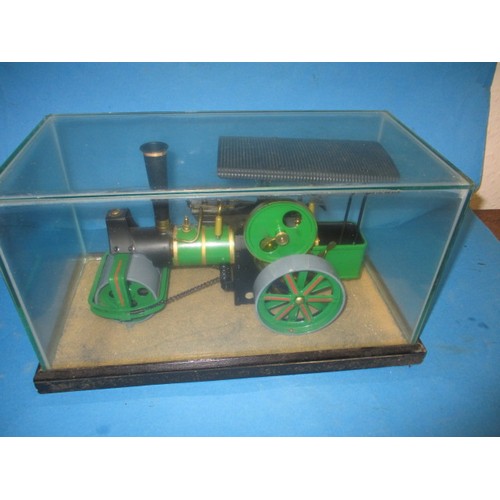 288 - A vintage Wilesco live steam roller, in glazed display case, approx. length of model 32cm in very go... 