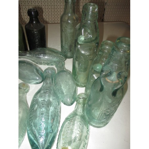 307 - 40 antique glass bottles, to include codd type and some from Norfolk, all in used condition