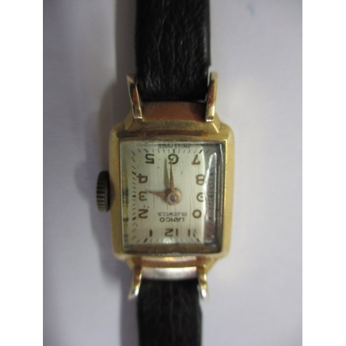 124 - A vintage 14k gold cased wrist watch and two other examples, none tested as to function and all with... 