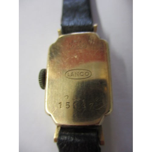 124 - A vintage 14k gold cased wrist watch and two other examples, none tested as to function and all with... 