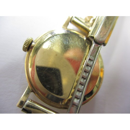 124 - A vintage 14k gold cased wrist watch and two other examples, none tested as to function and all with... 