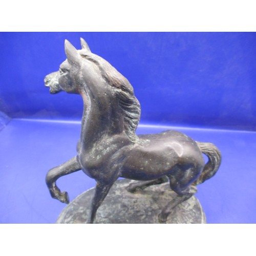 165 - An antique cast bronze horse sculpture, approx. width 14cm approx. height 15.5cm in good condition w... 