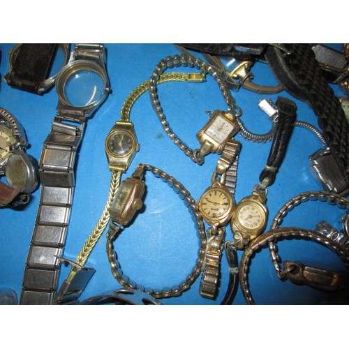 317 - A watch repairers cabinet with contents of parts and watches, all in used condition