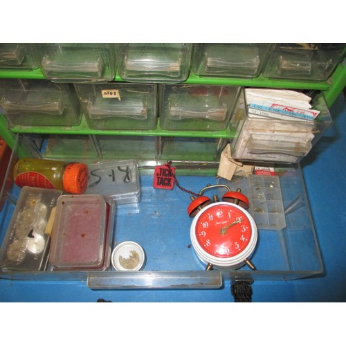 317 - A watch repairers cabinet with contents of parts and watches, all in used condition