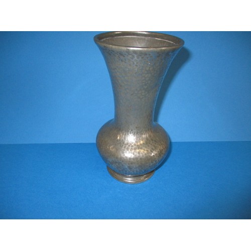 172 - A 1930s Tudric hammered pewter vase, approx. height 17cm, having some minor denting to waist and gen... 