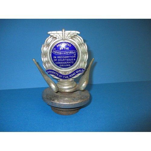 168 - An early 20th car radiator cap with wings and enamelled plaque for knights of the road presented by ... 