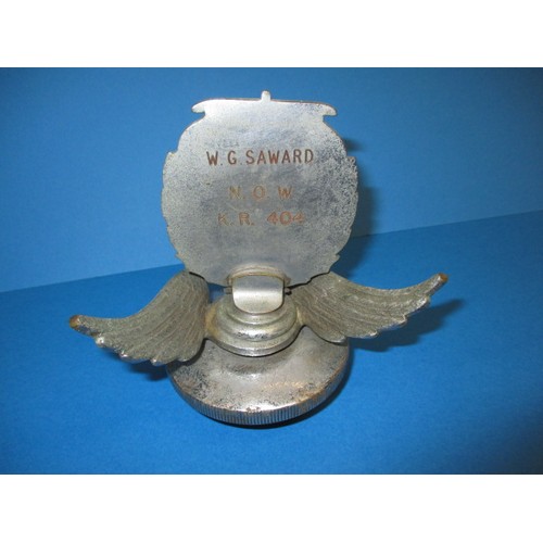 168 - An early 20th car radiator cap with wings and enamelled plaque for knights of the road presented by ... 