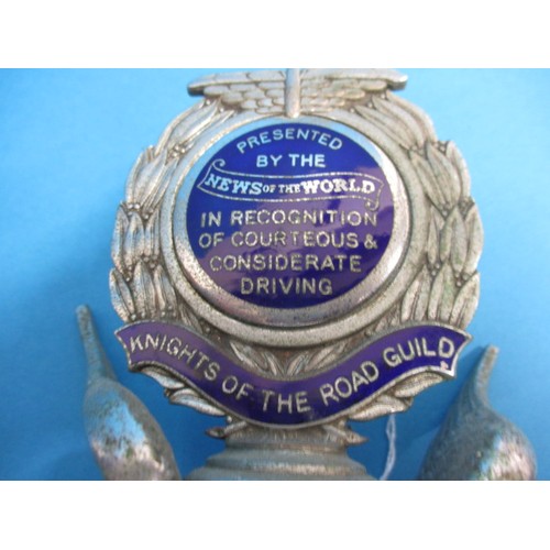 168 - An early 20th car radiator cap with wings and enamelled plaque for knights of the road presented by ... 