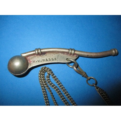 192 - A vintage bosuns whistle with long white metal chain, in good working order with age related tarnish... 