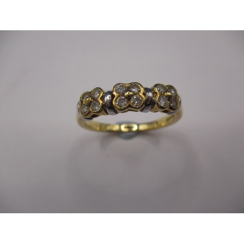A vintage 18ct yellow gold ring set with 3 clusters of 4 diamonds, approx. ring size ‘O’ approx. weight 4.6g in good pre-owned condition