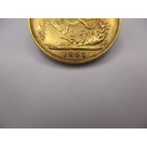 144 - A Victorian full gold sovereign, dated 1895, a good BV grade coin with good definition of features