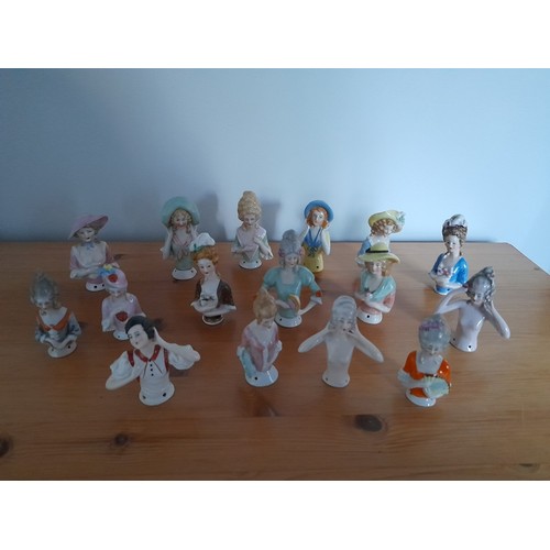 316 - A large quantity vintage half dolls, to include several art deco examples, all in pre-owned conditio... 