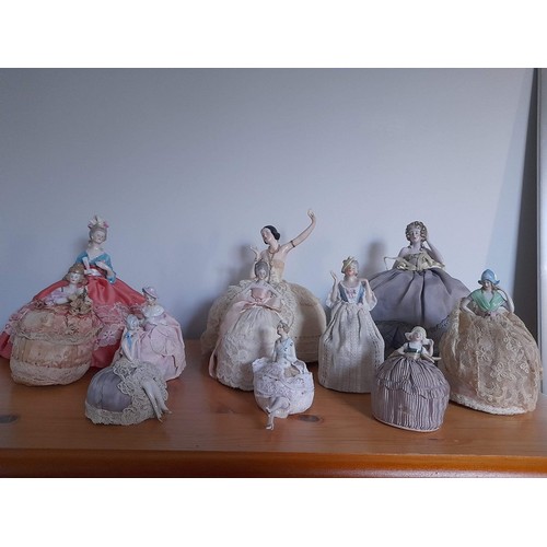 316 - A large quantity vintage half dolls, to include several art deco examples, all in pre-owned conditio... 