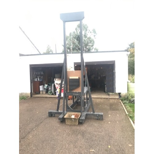 255 - A stage prop full size working guillotine, having magnetic heads, folds flat for ease of transport, ... 