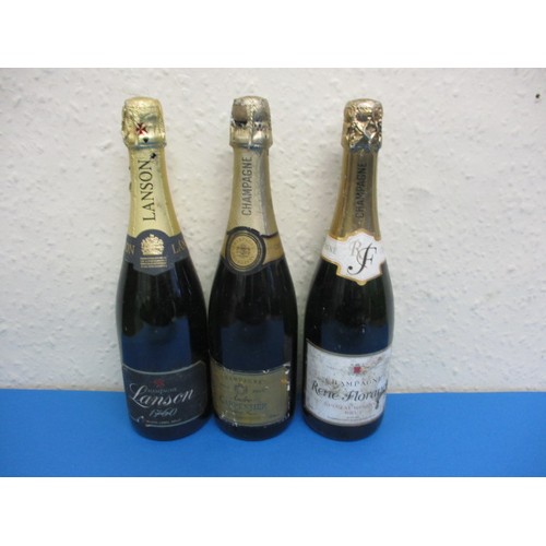 255 - Three bottles of Brut champagne, to include a Lanson black label, all 750ml