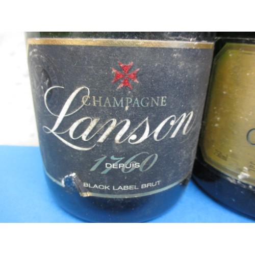 255 - Three bottles of Brut champagne, to include a Lanson black label, all 750ml