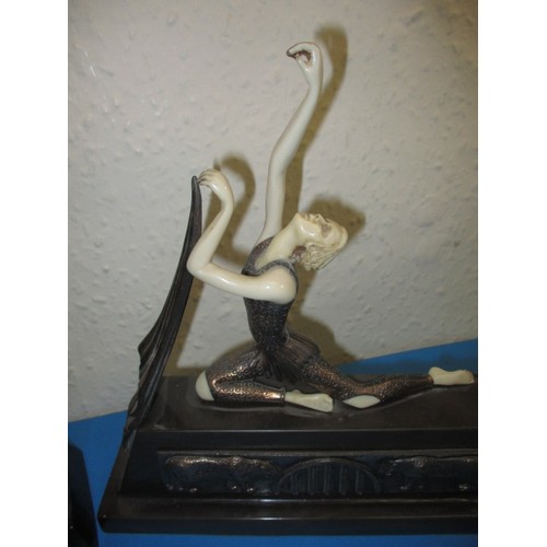 136 - Two late 20th century art deco figures, both in used condition, one with a loose arm, but no damage