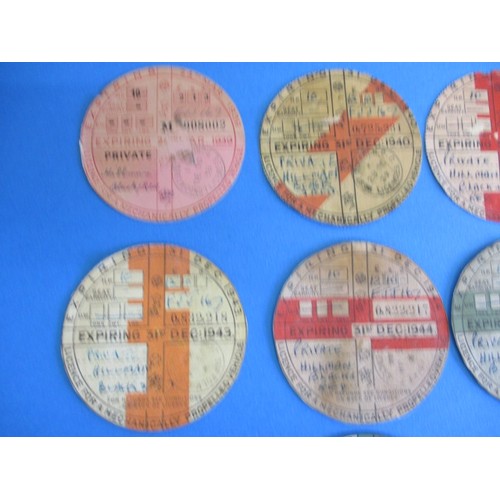 129 - A collection of vintage vehicle excise duty discs, (formally known as road tax) dating 1939 to 1952,... 