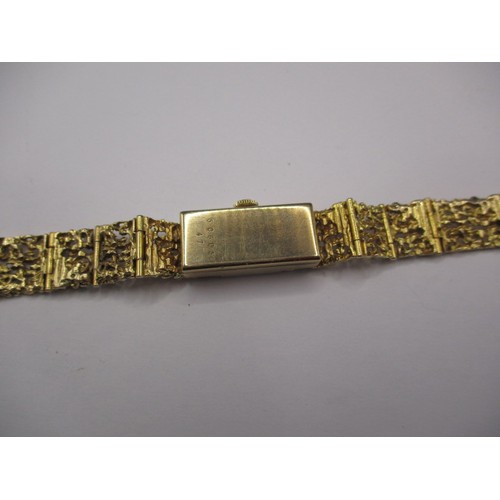 63 - A vintage gold cased and strapped ladies wrist watch, approx. gross weight 24.4g, not tested as to f... 