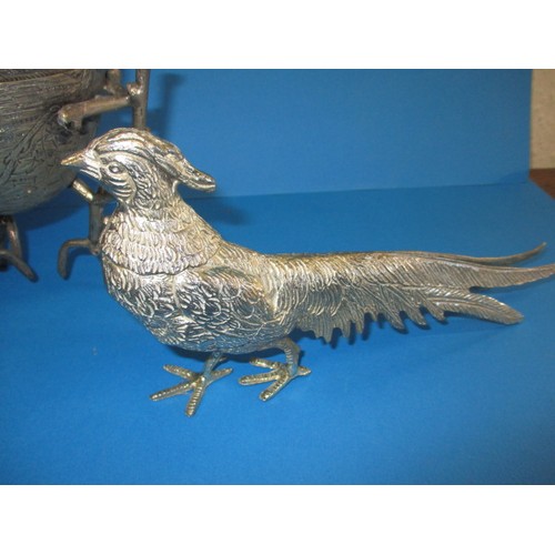 128 - Table decorations consisting of 2 white metal pheasants and a covered pot with a nesting bird