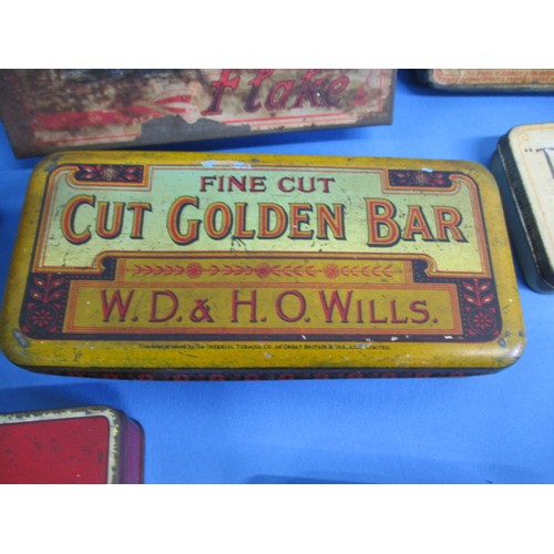 162 - A collection of vintage tins, to include several tobacco examples, all in used condition with age re... 