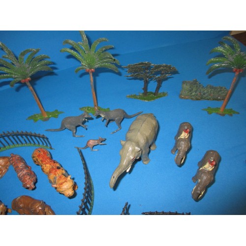 163 - A parcel of 1930s die-cast zoo figures, to include various animals and fencing, some by Britain’s, m... 