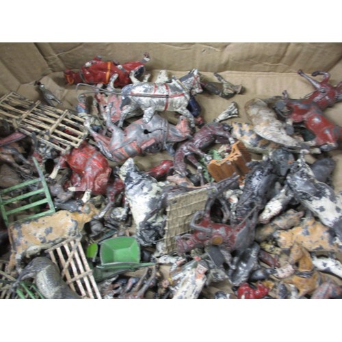 164 - A large quantity of early 20th century die-cast farm items, to include animals and carts, some by Br... 