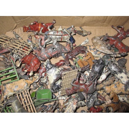 164 - A large quantity of early 20th century die-cast farm items, to include animals and carts, some by Br... 