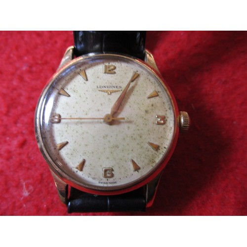 64 - A vintage 9ct gold Longines wrist watch, in current working order, approx. dial size 30mm, having us... 