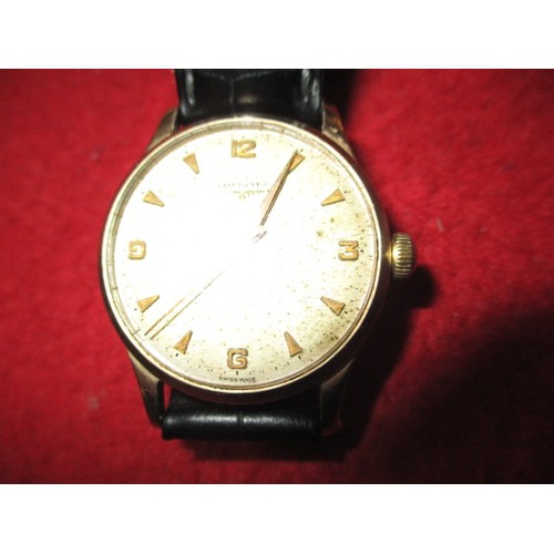 64 - A vintage 9ct gold Longines wrist watch, in current working order, approx. dial size 30mm, having us... 