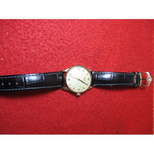 64 - A vintage 9ct gold Longines wrist watch, in current working order, approx. dial size 30mm, having us... 