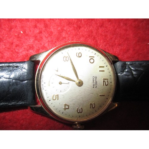 65 - A 1950s Buren Grand Prix 9ct gold cased wrist watch, in current working order, approx. dial size 27m... 