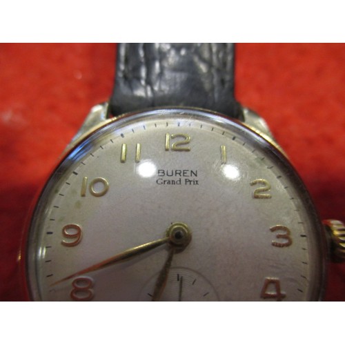 65 - A 1950s Buren Grand Prix 9ct gold cased wrist watch, in current working order, approx. dial size 27m... 