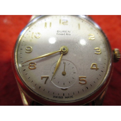 65 - A 1950s Buren Grand Prix 9ct gold cased wrist watch, in current working order, approx. dial size 27m... 