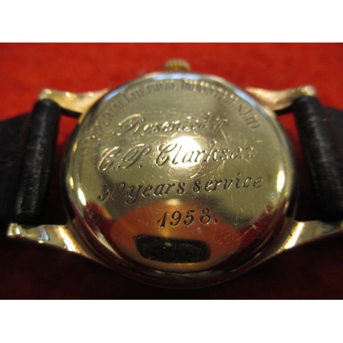 65 - A 1950s Buren Grand Prix 9ct gold cased wrist watch, in current working order, approx. dial size 27m... 