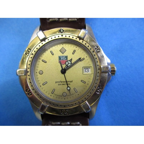 73 - A pre-owned Tag Heuer professional 200 meters sports watch, in working order, approx. dial size 23mm... 