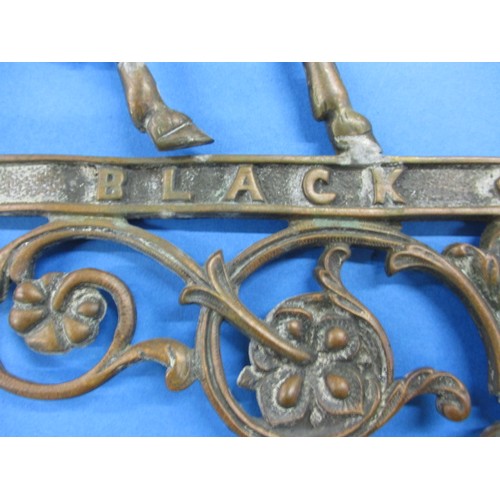 165 - A vintage brass horse profile, marked for Black Eagle, approx. length 37cm, with age related tarnish... 