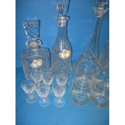 235 - A parcel of glass decanters and numerous drinks glasses, some in sets, and with 6 Coalport decanter ... 