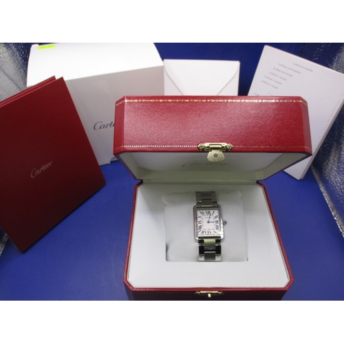 75 - A Cartier ‘TANK’ watch in good working order with box and paperwork, in used condition